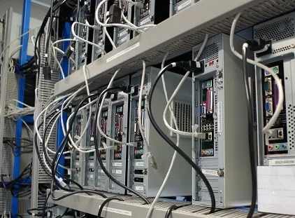 Back of a server rack with cabling and hardware connections
